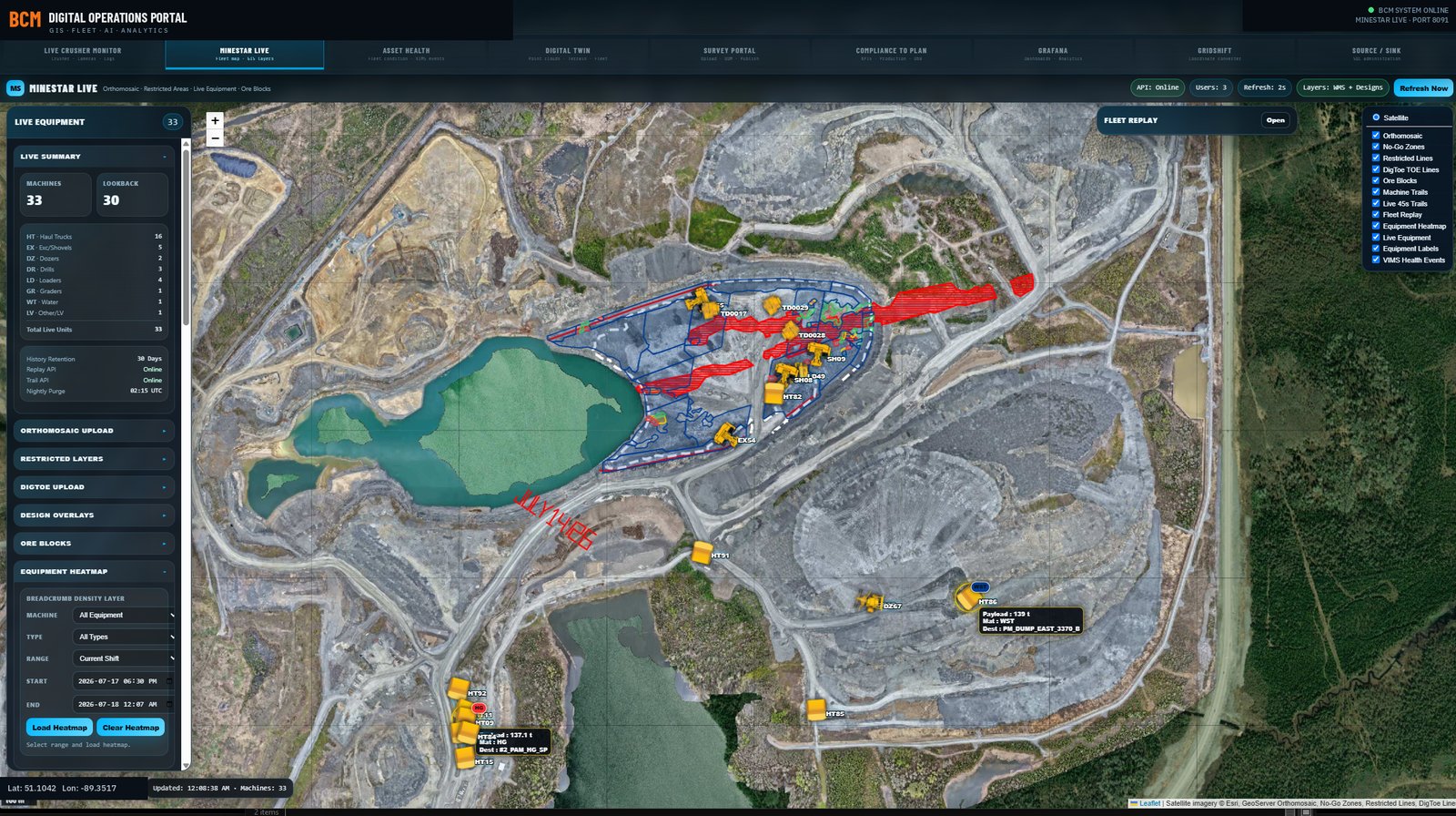 Live mine operations map with equipment positions, trails, and design overlays